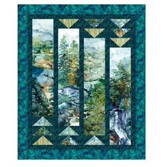 a quilted wall hanging with trees and mountains in the background, on top of a blue