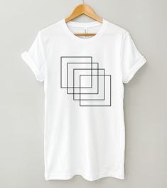 Abstract Graphic Tee, Abstract Squares Shirt, Minimalist T-shirt, Shapes Tee, Line Art, Geometric Art, Geometric Tshirt, Minimal Shirt MADE IN THE U.S.A. PLEASE READ BEFORE PURCHASING Production: 1-4 business days Shipping: 2-5 business days (We have no control over delays related to the postal service) *PLEASE EXPECT DELAYS DURING THE HOLIDAYS* SIZING The Bella + Canvas 3001 tee is a unisex fit, meaning it's a bit more slim through the midsection than a traditional men's tee, but not quite as f Line Art Geometric, Shirt Graphics, Abstract Graphic, Art Geometric, Postal Service, Modern Boho, Geometric Art, Geometric Design, Mens Tees