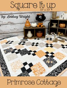 an image of a quilted table top with pumpkins on it and the words, square it up by lindsey weight primrose cottage