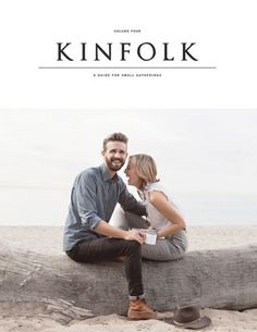 a man and woman sitting on top of a log in front of the ocean with text that reads, kinfolk