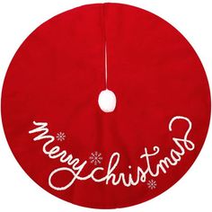 a red christmas tree skirt with the words merry christmas written on it