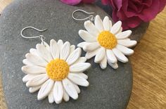 "Handmade large daisy dangle earrings earrings.  Extremely lightweight, made from polymer clay, with a choice of gold tone, silver tone or sterling silver ear hooks. Each daisy measures 4cm/1 5/8\" in length, plus ear wire, roughly 4cm/  1 5/8'' wide (see photos in my hand for size). Great summer accessory, lovely gift. Also available as a yellow sunflower. UK made earrings." Handmade Daisy-shaped Earrings For Gifts, Handmade Daisy-shaped Earrings As Gift, Handmade Daisy Shaped Earrings As Gift, Handmade Daisy Earrings As Gift, Handmade Daisy White Earrings, Handmade White Daisy Earrings, Handmade Daisy-shaped Jewelry For Everyday, Handmade Daisy-shaped Everyday Jewelry, Everyday Handmade Daisy-shaped Jewelry