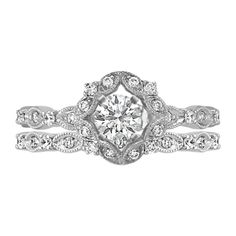 a diamond engagement ring set on top of each other