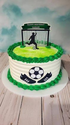 a soccer themed birthday cake on a table