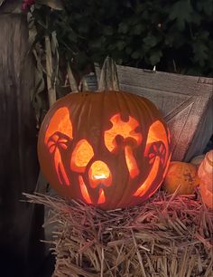 a pumpkin carved to look like it has been carved into the shape of a face