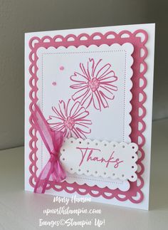 a handmade card with pink flowers on it and the words thanks written in white