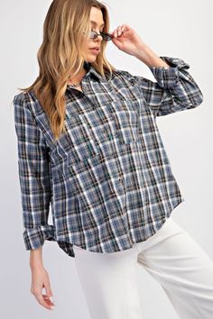 Details Brand: Easel Cotton Top Plaid Print Front Button Down Collared Neckline Long Sleeves Roll Up Sleeve Tab Double Button Cuffs Bust Patch Pocket Rounded Hem Material and Care 100% Cotton Hand Wash Cold Hang or Line Dry Measurements of Garment Bust of the garment is measured armpit to armpit and then doubled. Length of the garment is measured from the top of the shoulder to the bottom of the hem line. Sleeve Length of the garment is measured from the top part of the shoulder seam to sleeve o Plaid Blouse With Button Closure And Relaxed Fit, Casual Plaid Tops With Button Cuffs, Plaid Relaxed Fit Blouse With Button Closure, Relaxed Fit Plaid Top With Buttons, Relaxed Fit Plaid Blouse With Button Closure, Plaid Long Sleeve Relaxed Fit Tops, Flannel Button-up Top With Pockets, Plaid Button-up Top With Pockets, Consuela Bags