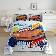 a bed with a football on it in a room