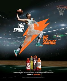 a basketball player jumping up into the air with a ball in his hand and two bottles of juice below him