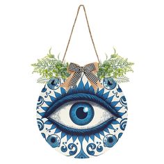 a blue and white evil eye hanging decoration