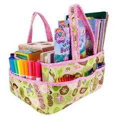 a child's storage bag filled with books and toys