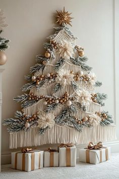 a christmas tree decorated with gold and white ornaments, wrapped presents under the tree is an ornament