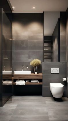 a modern bathroom with two sinks and a toilet