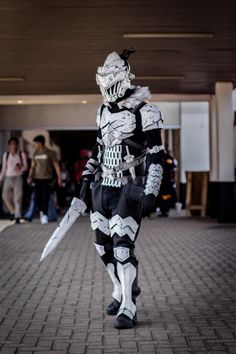 a person in a costume walking down a street