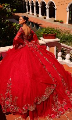 Wow the crowd in this red quinceañera dress with bell sleeves. This showstopping red quince dress comes with all the bells and whistles, from bead and stone-embellished embroidered lace to vibrant 3-D flowers. The sweetheart bodice of this open-back quince dress boasts a lace-up feature that adjusts for a comfortable fit. Embellished sheer bell sleeves add feminine flair, and the layered poofy skirt is sure to have your guests swooning. Celebrate your milestone fiesta in glamorous style when you Red Quince Dress, Red Quinceanera Dress, Quinceanera Stuff, Quinceanera Dresses Red, Xv Dresses, Quincenera Dresses, Quinceanera Collection, Red Quince, Red Quinceanera Dresses