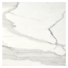 a white marble textured surface with grey streaks