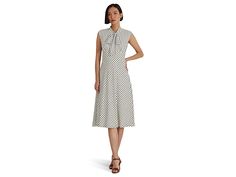 LAUREN Ralph Lauren Polka Dot Tie Neck Georgette Dress - Women's Dress : Cream/Navy : The primary materials that compose this product contain a minimum of 20 percent recycled content. ; Style your look in the vintage-inspired design of the LAUREN Ralph Lauren Polka Dot Tie Neck Georgette Dress and create a memorable day out. Midi-length dress. Pullover style. A-line silhouette. Made from a georgette fabric with allover classic polka dot print. Tie-up neckline and sleeveless construction. Straigh Polka Dot Tie, Georgette Dress, Dress Cream, Georgette Fabric, Vintage Inspired Design, Midi Length Dress, Cream Dress, Polka Dot Print, Tie Neck