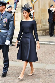 the duke and princess are walking together in uniform