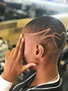 Shaved Back Of Head Designs, Low Fade Haircut Women With Design, Shaved Hair Designs For Black Women, Heart Design Haircut, Low Cut Hair Black Women Designs, Barber Designs In Hair Women, Shaved Head Butterfly Design, Hair Designs For Boys