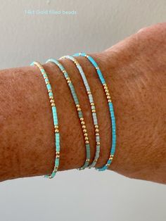 4 Bright summer colored gold filled beaded stack bracelets - Etsy Portugal Diy Bracelet Designs, Beads Bracelet Design, Summer Bracelets, Bracelets Handmade Beaded, Glass Beaded Bracelets, Seed Bead Bracelets, Memory Wire, Wire Bracelet, Hand Jewelry