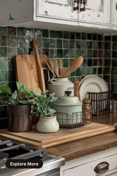 a kitchen counter with pots and pans on it