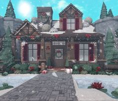 a christmas scene with a house in the snow