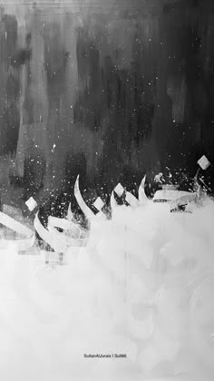 black and white photograph of boats in the water on a cloudy day with snow flakes