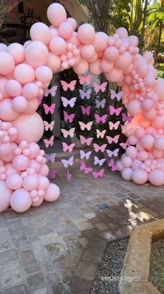 a bunch of balloons that are in the shape of butterflies