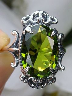 Green Peridot Ring Gothic Gemstone Rings With Oval Shape, Gothic Oval Gemstone Rings, Gothic Green Jewelry For Gifts, Green Gothic Jewelry For Gifts, Green Gothic Jewelry Gift, Green Gothic Style Jewelry Gift, Victorian Green Ring As A Gift, Gothic Oval Collectible Jewelry, Collectible Gothic Oval Jewelry