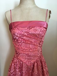 "Beautifully feminine pink lace & satin party dress with basque waist and ruching is a custom made creation from the 1980's. Dress has spaghetti straps, zips up in the back and is lined in satin. Dress is in excellent condition. Chest 32\"-34\" Waist 26\" Hips 44\" plus Length from armpit to hem 35\" All vintage is sold in \"as-is\" condition. We do our best to inspect, correct, and list important flaws. All measurements are made with the garment laying flat. Length is measured from shoulder Vintage Strapless Pink Dresses, Vintage Satin Dress, Satin Party Dress, Basque Waist, Visual Archive, Lace Party Dress, Prom Inspo, Lace Party Dresses, Dream Dresses