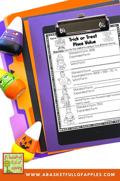 a clipboard with halloween themed writing on it