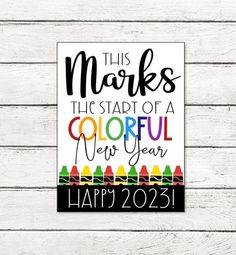 a colorful new year card with the words, this marks the start of a colorful new year