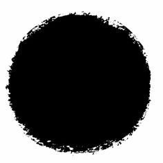 a black circle that has been drawn with brush