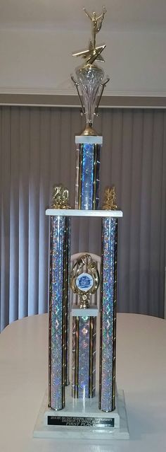 a trophy sitting on top of a white table