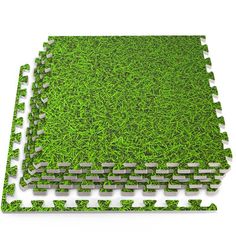 green grass tiles are arranged on top of each other