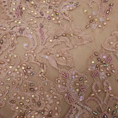 Elevate your creations with our exquisite Light Brown Floral Heavily Beaded Embroidered Lace. Meticulously crafted with intricate floral patterns, this lace features delicate beadwork that shimmers with elegance. The light brown hue provides a versatile backdrop, perfect for complementing a variety of colors and styles. Ideal for adding a touch of sophistication to evening gowns, bridal wear, and upscale fashion pieces, this lace ensures every design stands out with grace and grandeur. Our heavi Elegant Beaded Sequin Fabric, Elegant Embellished Embroidered Fabric, Evening Embroidered Sequins Fabric, Festive Fitted Beaded Embroidered Fabric, Festive Fitted Embroidered Beaded Fabric, Festive Fitted Embroidered Fabric With Beaded Details, Party Embellished Embroidered Fabric, Party Lace Embroidered Fabric With Beads, Fitted Embroidered Fabric For Evening Wear