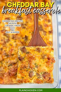 cheddar bay breakfast casserole on a plate with a wooden spatula