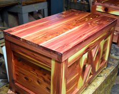 two wooden boxes sitting next to each other