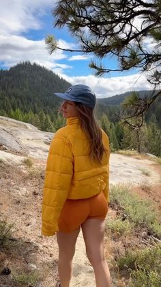 Trails are calling - better dress the part. | trail outfit, hiking outfit, hiking outfit summer, hiking outfit spring, biking outfit women, biking outfit aesthetic, hiking fits, hiking apparel, puffer jacket, yellow outfit aesthetic, orange outift aesthetic, biking shorts outfit, halfdays Biking Outfit Aesthetic, Biking Shorts Outfit, Biking Outfit Women, Yellow Outfit Aesthetic, Biking Shorts