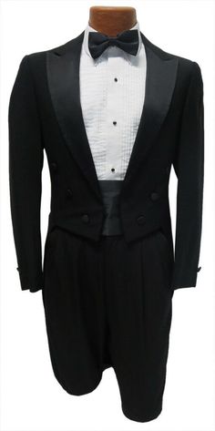 Boys Black Tuxedo Tailcoat This purchase is for a handsome full dress black tuxedo tailcoat.  The coat features a six button front with satin peak lapels.  Black satin buttons and trim.  Fully lined interior.  These are tailored in a high quality 100% worsted wool. Listing is for the tailcoat only.   To purchase a tuxedo shirt please visit my eBay store. Wedding Tailcoat, White Tie Wedding, Peak Lapel Tuxedo, Wedding Ring Bearer, Designer Formal Dresses, Classic Tuxedo, Slim Fit Tuxedo, Vest And Tie, Tuxedo Dress