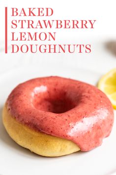 a close up of a doughnut on a plate with lemons in the background