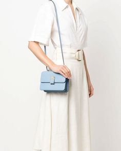 Valextra Nolo Crossbody Mini Bag in Light Blue Magnetic closure with V-Cut detail Detachable shoulder strap Internal slip pocket Silver toned hardware Calfskin outer and lining 7.4” W x 5.3” x 2.3 D Made in Italy Mini Crossbody Bag, V Cut, Leather Goods, Magnetic Closure, Small Bags, Mini Bag, Calf Skin, 3 D, Crossbody Bag