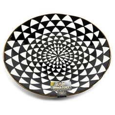 a black and white plate with an abstract design