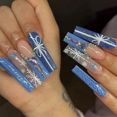 PRICES MAY VARY. Package Contains：You will get 24 pieces blue Christmas fake nails Long in 12 sizes, 1 piece mini nail file, 24 pieces nail double-side stickers, 1 piece wooden stick for removing nails tips. Christmas Design：This blue press on nails Christmas features a classic winter element Christmas Snowflake pattern and Rhinestone glitter design to make your nails look more noble and express your love for winter. High Quality：These coffin press on nails Christmas are made of high quality material which can last weeks, but won't cause any discomfort to your nails or skin. If stored properly, these winter Xmas nails fingernails can be used indefinitely. Easy to Use：Christmas acrylic nails are convenient and affordable. You can get the same nail art effect in 3 minutes, instead of spendin Flat Nails, Snowflake Snowman, Acrylic Nails Nude, Christmas Manicure, Nail Type, Xmas Nails, Pretty Acrylic Nails, Nail Arts