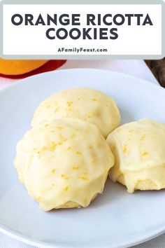 orange ricotta cookies on a white plate with text overlay that says orange ricotta cookies