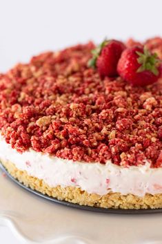 strawberry crunch no bake cheesecake on a plate