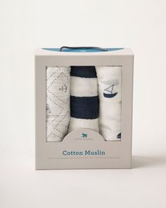 three pairs of cotton mulli socks in a gift box with blue trimmings