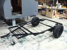 the trailer is being assembled and ready to be put into place in the shop or workshop