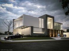 a car is parked in front of a modern house