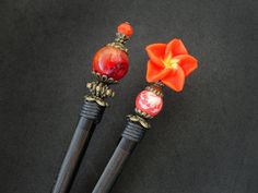 * Usable length of both hair sticks: made to order * Beaded tops height: 3.5-3.7cm / 1.4" - 1.5" Stick 1 * Bead type: ceramic * Bead size: 16mm, 10mm / 0.63", 0.4" * Stick type: painted wood (safe for skin and hair) * Metal elements color: antique bronze Stick 2 * Bead type: polymer clay flower, crackle glass * Bead size: 20mm, 8mm / 0.8", 0.32" * Stick type: painted wood (safe for skin and hair) * Metal elements color: antique bronze ✿ CARE INSTRUCTIONS ► Hold your hair stick firmly while using Wooden Hair Sticks, Hair Metal, Bead Hair Accessories, Beaded Hair, Polymer Clay Flowers, Bronze Metal, Crackle Glass, Hair Beads, Metallic Hair